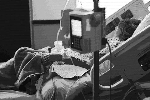 A woman on a hospital bed