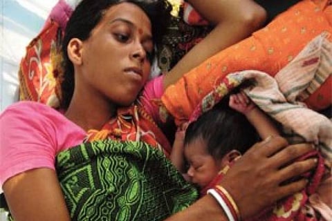Photo of a woman availing treatment in hospital
