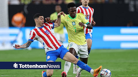 Vinicius Junior in action for Brazil, taking on Paraguay's Miguel Almiron.