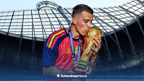 Tottenham star Pedro Porro kissing the World Cup in a Spain shirt