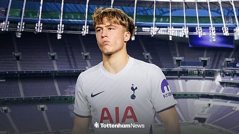 Oliver Boast playing for Tottenham, with Tottenham Hotspur Stadium in the background