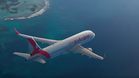 Air Arabia aircraft on tarmac representing record 2025 financial results with AED 1.8 billion net profit and 21.8 million passengers carried