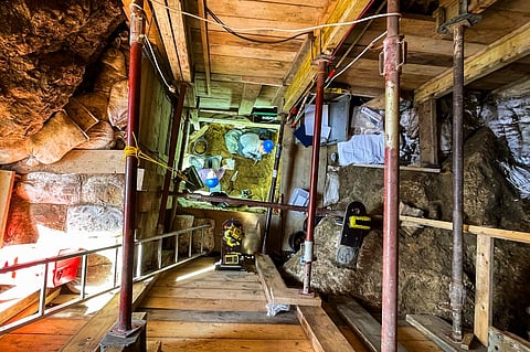 This handout photograph released on January 31, 2024 by the Max-Planck Institute of Leipzig shows scaffolding erected to support a trench, so that the Lincombian-Ranisian-Jerzmanowician (LRJ) layers could be excavated to a depth of 8 metres, at the archaeology site in Ranis, Germany. The icy climate did not frighten them: 'pioneer' groups of Homo sapiens ventured into north-western Europe much earlier than previously thought, 45,000 years ago, several thousand years before the disappearance of the Neanderthals, studies revealed on January 31, 2024.