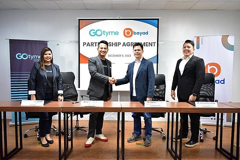 PHOTOGRAPH COURTESY OF GOTYME
(From left) GoTyme Bank’s head of Payments Maria Rosario Aguirre, GoTyme Bank’s chief marketing
officer Raymund Villanueva, Bayad chief commercial and marketing officer Dennis S. Gatuslao, and
Bayad vice president and head for Commercial Group Bob Conrad Aquino.
