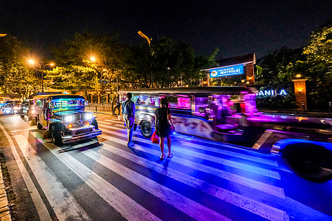 Legal tug-of-war A public utility jeepney yields to pedestrians along Padre Burgos Street in Manila yesterday. The PUV modernization battle continues as the Supreme Court decision keeps the wheels turning. Transport groups petitioned for certiorari and injunction, including a temporary restraining order, to prevent implementing the public utility vehicle modernization program. | PHOTOGRAPH BY KING RODRIGUEZ FOR THE DAILY TRIBUNE