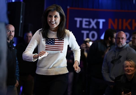 Republican presidential candidate, former U.N. Ambassador Nikki Haley, arrives to speak during a campaign event held at the Courtyard Hotel on 20 January 2024, in Nashua, New Hampshire. (Photo by Joe Raedle/Getty Images/AFP)