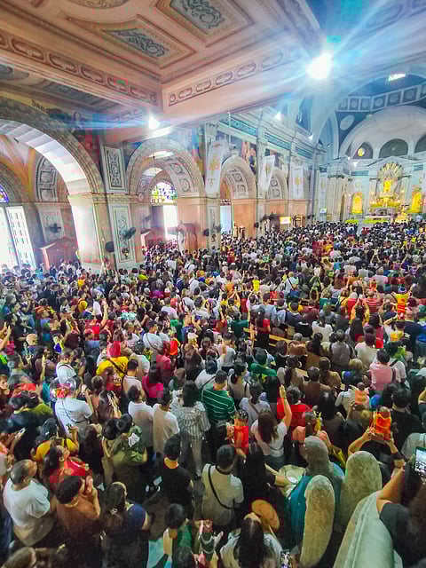 Thousands of devotees of the Santo Niño flock the Archdiocese of Santo Niño de Tondo Church on Sunday, 21 January 2024 in Tondo, Manila with their images of the child Jesus.