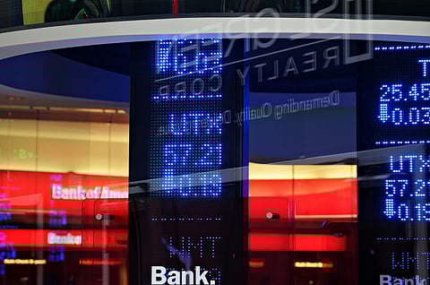 Stock markets waver, oil prices edge up
