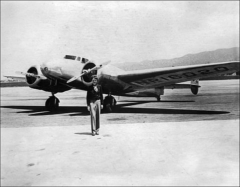 (FILES) Undated picture taken in the 30' s of US aviator Amelia Earhart in front of her plane. A deep sea exploration company released a sonar image on January 29, 2024 they say may be the remains of the plane of Amelia Earhart, the famed American aviatrix who disappeared over the Pacific in 1937. Deep Sea Vision (DSV), a South Carolina-based firm, said the image was captured after an extensive search in an area of the Pacific to the west of Earhart's planned destination, remote Howland Island.