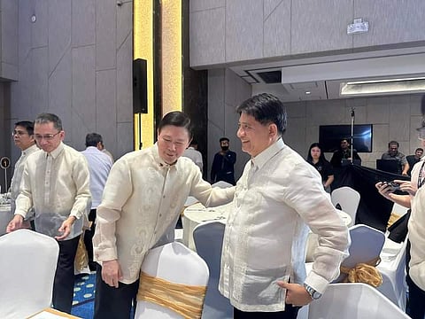 PhilHealth’s CEO Emmanuel Ledesma welcomes Presidential Adviser on Poverty Alleviation Secretary Larry Gadon (right) who gave the keynote address for the 29th anniversary of the premier health agency.