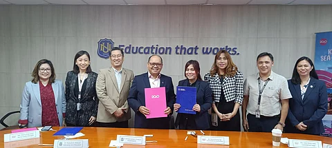 Sealing the collaboration between NU and 2GO are (from left) Dr. Leonora Concepcion, NU Mall of Asia executive director; Sheryl Chua, 2GO senior sales manager; Dr. Rosauro Manuel, NU Group academic officer and chief information officer; Dr. Renato Carlos Ermita Jr., NU president and CEO; Sharon Ngo, 2GO business unit head of Sea Solutions; Cecil Valle, 2GO head of commercial sales; Rolando Averilla, NU vice president for corporate affairs; and Dr. Medelene Forbes, NU Manila College of Tourism and Hospitality Management dean.
