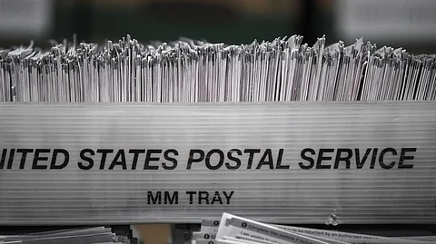 The organization and its founder James O'Keefe, known for sting operations targeting progressives, admitted in statements Monday they had helped broadcast the lie, after settling a defamation lawsuit brought by the postmaster.