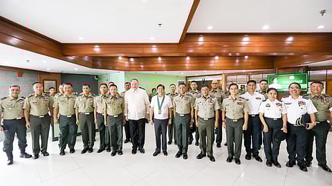 Chief of Staff of the Armed Forces of the Philippines Gen. Romeo S. Brawner Jr., Defense Secretary Gilberto Teodoro Jr., and Army Chief Lt. Gen. Roy M. Galido accompanied President Ferdinand Marcos Jr. during his talk at Fort Bonifacio, Taguig, Monday, 12 February.
