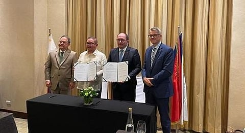 Agriculture Secretary Francisco Tiu Laurel (second from left) and Czech Minister of Agriculture Marek Výborný (third from left) show the signed letter of intent on agriculture and food industry. At the event are (from left) Agriculture Undersecretary Jerome Oliveros, Tiu Laurel, Výborný and Czech Ambassador Karel Hejč.