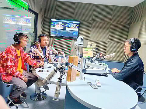 ROEL Arthur Ali Jr. (center), deputy mayor of Ata Tribe, and Datu Berne Onggay, tribal leader of Ata Tribe (left), with ‘Laheng te Tribu’ anchor Juls Sigcara discussing the advocacies, culture and history of the Ata over Davao City Disaster Radio on 6 March 2024.