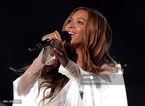 (FILES) Beyoncé performs on stage at the 57th Annual Grammy Awards in Los Angeles February 8, 2015.
Beyonce has figured prominently in show business for nearly three decades, shapeshifting from girl group lead and pop queen to Hollywood actor and visual pioneer.
She's a business mogul who single-handedly rewrote music's marketing playbook, and most recently stepped out as electro-disco revivalist who now has more Grammy wins than anyone.
But for all the caps she's worn, the Houston-bred megastar's cowboy hat has stayed within reach: Beyonce has always been country. Now she's firmly entered her yeehaw era: "Cowboy Carter," the second act of her Renaissance project, is set to drop Friday at midnight.