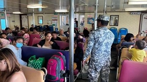 ON ALERT. A Philippine Coast Guard troop checks passengers at the Balingoan Port in Misamis Oriental province on Wednesday 27 March 2024.
The PCG is working with the Philippine National Police (PNP) and the Philippine Ports Authority (PPA) to address the expected influx of passengers in maritime gateways for the Holy Week.