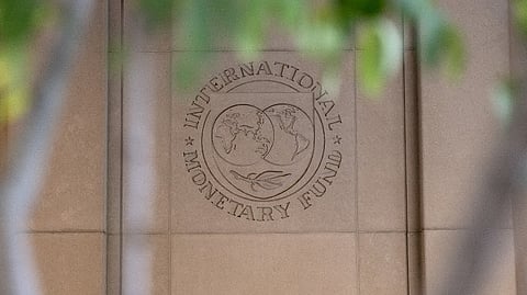 (FILES) The International Monetary Fund (IMF) logo is displayed outside its headquarters in Washington, DC, on 8 October 2022.