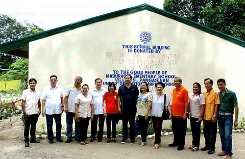 Officials of the Federation of Filipino-Chinese Chamber of Commerce and Industry Inc. meet with officials of the Villasis, Pangasinan provincial government after donating two school room buildings at Maburac Elementary School in Villasis during a turnover ceremony last 29 August 2017.