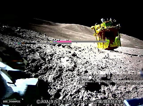 (FILES) This handout photo released on 25 January 2024 from the Japan Aerospace Exploration Agency (JAXA) and credited to JAXA, Takara Tomy, Sony Group Corporation and Doshisha University shows an image of the lunar surface taken and transmitted by LEV-2 "SORA-Q" the transformable lunar surface robot "SORA-Q" (operation verification model), installed on the private company's lunar module for the Smart Lander for Investigating Moon (SLIM) mission, after landing on the Moon on January 20. Japan's unmanned Moon lander woke up after surviving a second frigid, two-week lunar night and transmitted new images back to Earth, the country's space agency said on 28 March.