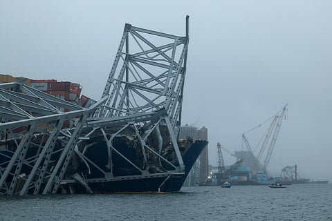 First vessel passes near collapsed channel bridge