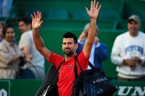 Serbia's Novak Djokovic gestures to the public as he leaves the court at the end of his Monte Carlo ATP Masters Series Tournament semi final tennis match against Norway's Casper Ruud on the Rainier III court at the Monte Carlo Country Club on April 13, 2024.