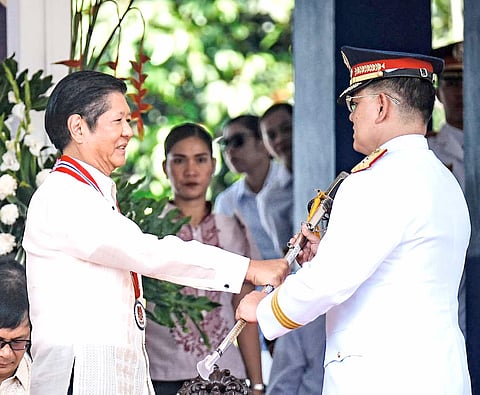 (File Photo) President Ferdinand "Bongbong" Marcos Jr. hands over the command saber to newly appointed Philippine National Police Chief General Rommel Francisco Marbil during the change of command ceremony in 1 April 2024. He replaced Gen. Benjamin Acorda Jr.