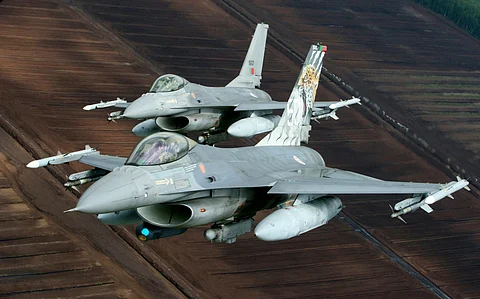 The single-engine F-16 fighter jet, two of which are shown being operated by the Portuguese Air Force, has seen various upgrades through decades of service in the United States and elsewhere.  