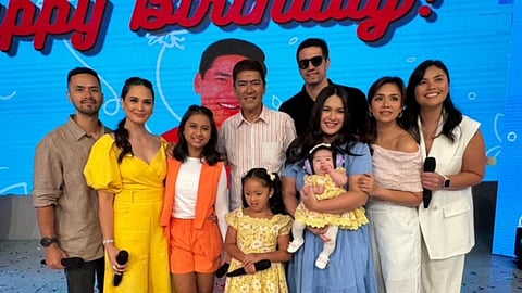 Vic Sotto (center) with his children and their spouses.