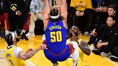 AARON Gordon of the Denver Nuggets soars
over LeBron James of the Los Angeles Lakers
during their NBA Western Conference first round
playoff series. The Nuggets won, 112-105.