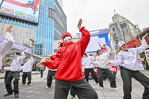 SOUTH Korea’s ruling People Power Party campaigners dance during a campaign ahead of the upcoming parliamentary elections in Seoul.