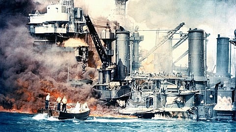 (FILES) This 7 December 1941 photo from The National Archives shows the USS West Virginia burning after the surprise Japanese attack on Pearl Harbor, Hawaii.