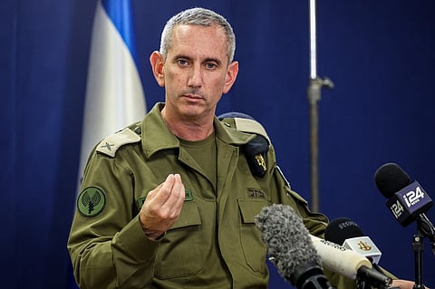 (FILES) Israeli army spokesman Rear Admiral Daniel Hagari speaks to the press from The Kirya, which houses the Israeli Ministry of Defence, in Tel Aviv on 18 October 2023. A blast ripped through a hospital in war-torn Gaza killing hundreds of people late on 17 October, sparking global condemnation and angry protests around the Muslim world. Spokesman Hagari on October 18 said that Israel had "evidence" that militants were responsible for the blast that killed hundreds at a Gaza hospital, saying a review proved others were at fault.