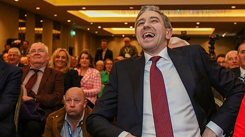 (FILES) Simon Harris laughs during the Fine Gael convention at the Sheraton Hotel in Athlone, central Ireland on 24 March 2024, before being declared leader and de facto prime minister-in-waiting.