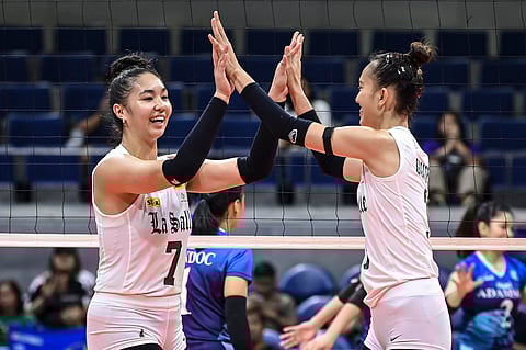 SHEVANA Laput and Thea Gagate celebrate after lifting De La Salle University to a 17-25, 25-19, 25-11, 25-22 win over Adamson University in Season 86 women’s volleyball tournament yesterday at the Smart Araneta Coliseum.