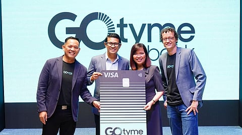 (FILE PHOTO) From left: GoTyme Bank co-CEO Albert Tinio, Visa country manager for the Philippines and Guam Jeff Navarro, BancNet CEO Emmie Reyes, and GoTyme Bank president and CEO Nathaniel Clarke seal partnership to promote better financial inclusion in the Philippines through the free GoTyme Bank ATM debit card and convenient services.