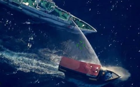 The civilian vessel Unaizah May 1 is harassed, blocked, and blasted with water cannon by a Chinese coast guard vessel while on a resupply mission to troops stationed at the BRP Sierra Madre in Ayungin Shoal on March 5, 2024