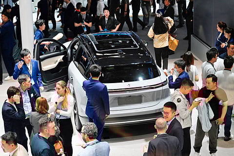 PEDRO PARDO/AGENCE FRANCE-PRESSE
THOUSANDS descend on Beijing for the Auto China Show.