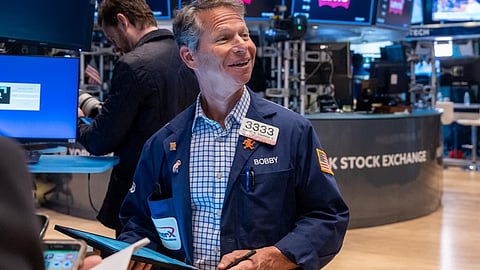 Traders work on the floor of the New York Stock Exchange on 5 April 2024, as US markets react to recent tariff policies and economic data.