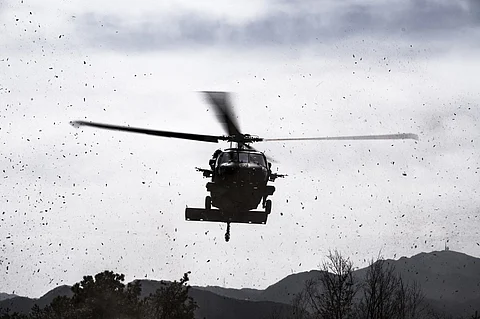 (FILES) In this handout photo from the US Department of Defense, soldiers from the 4th Battalion, 23rd Infantry Regiment, 2nd Stryker Brigade Combat Team, 2nd Infantry Division exit a UH-60M Black Hawk helicopter during an air assault as part of Exercise Warrior Shield on 14 March 2023 at Goldmine Training Area, South Korea. Two US Army HH60 Black Hawk helicopters with the 101st Airborne Division crashed in Kentucky during a training mission, killing nine soldiers, a military spokesman said Thursday.
