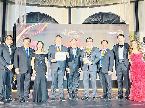 For his outstanding contributions to the legal profession, DivinaLaw managing partner Nilo T. Divina was honored by Rotary International 3780 with the Rotary Golden Wheel Award for Legal Practice. The Golden Wheel Award is bestowed on exemplary individuals best embodying the Rotary spirit of ‘Service Above Self,’ and upholding the Club's ‘4 Way Test’ guiding principles. Photo shows Golden Wheel awardee Atty. Divina (sixth from left) receiving the Award from Rotary officers (from left) Hope Creating president Paolo Sagana, district governor-elect Milo Lucenario, past president Joan Policarpio, Hope creating president Paul Macaraeg, district governor Paul Angel Galang, past district governor Rufino Policarpio, past president Robert Nazal and past district governor Bernadette Herrera.