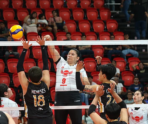 REMY Palma of Petro Gazz scores off the defense of Ria Meneses of Cignal during their PVL All-Filipino Conference encounter on Tuesday. The Angels prevailed, 25-13, 25-18, 25-17.
