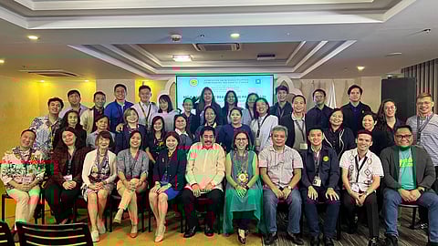 KWF chairman Dr. Arthur P. Casanova (seated, center) and UST SSAS chief Dr. Wennielyn Fajilan (seated, fourth from left) with fellow translators and educators.