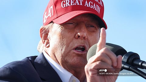 (FILES) Republican presidential candidate former President Donald Trump speaks to supporters during a rally at the Dayton International Airport on 16 March 2024 in Vandalia, Ohio.