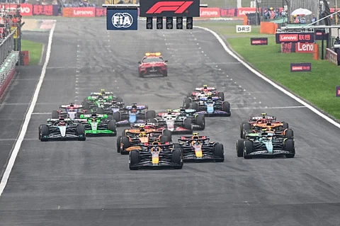 Red Bull Racing's Dutch driver Max Verstappen leads at the start of the Formula One Chinese Grand Prix race at the Shanghai International Circuit in Shanghai on 21 April 2024.