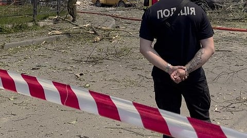 (FILES) Police stand in a cordon