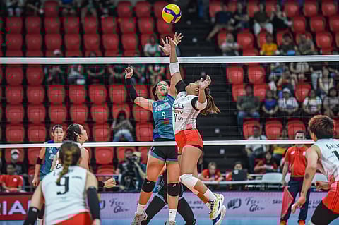 ALINA Bicar of Chery Tiggo and Audrey Paran of Galeries Tower engage in a joust during their PVL All-Filipino Conference game. The Crossovers prevailed, 26-24, 23-25, 19-25, 25-12, 15-9.