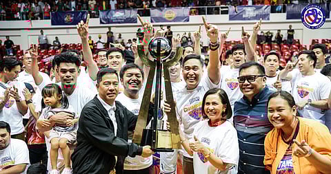 QUEZON Province Gov. Helen Tan receives the trophy from PSL president Cris Bautista and special assistant to the chief executive officer Bhong Baribar after the Titans defeated Nueva Ecija, 77-64, in Game 4 of their President’s Cup best-of-five finals series.
