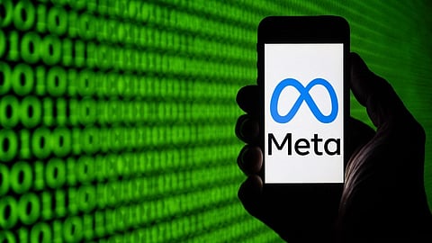 (FILES) This picture taken on 25 March 2024, shows the Meta (former Facebook) logo on a smartphone in Mulhouse, eastern France.