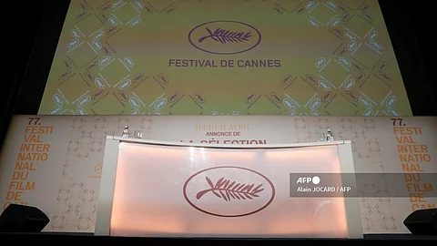 A photo shows the festival logo on the set ahead of a press conference to announce the official selection of the 77th edition of the Cannes Film Festival, at the UGC Normandie Cinema in Paris, on 13 April 2024. The 77th edition of the Cannes Film Festival runs from 14 to 25 May 2024.
